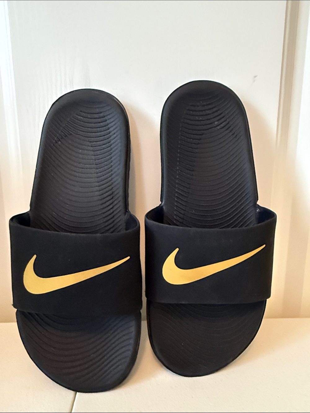 Nike Kids Black Slide Sandals with Gold Swoosh (sz 3 youth)